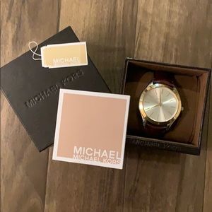 Michael Kors leather strapped women’s watch